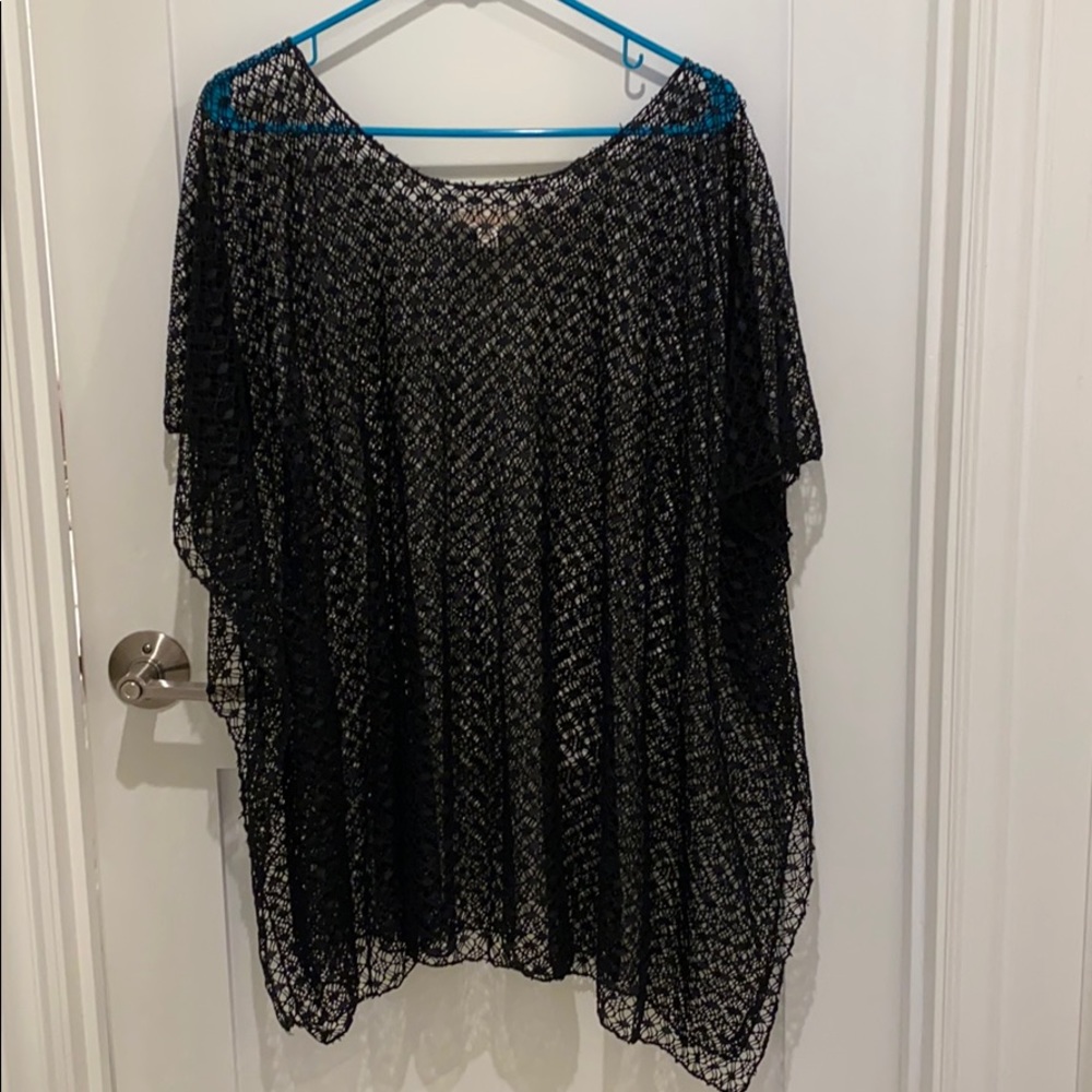 Women’s black swim suit over up